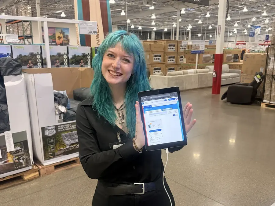 A rep running an in-store campaign with a tablet